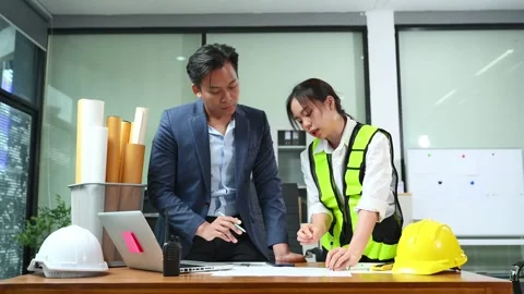 Creative architect projecting on the big drawings with architectural projec.. Stock Footage 312774974