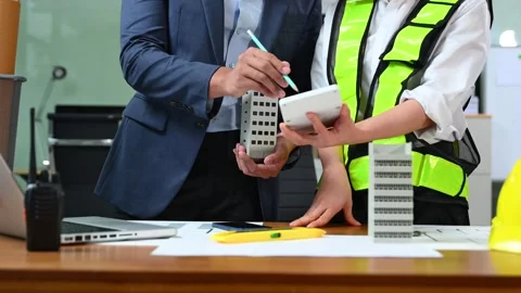 Creative architect projecting on the big drawings with architectural projec.. Stock Footage 312775046