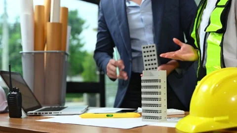 Creative architect projecting on the big drawings with architectural projec.. Stock Footage 312775062