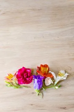 Creative arrangement made of different flowers on wooden background with spac 写真素材