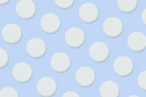 Creative art made with cookies pattern on pastel blue background Stock Photos