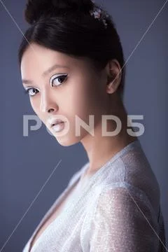 Creative art make-up and hairstyle. Portrait of beautiful asian girl Stock Photos