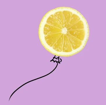Creative artwork. Slice of lemon as air balloon. Fruit with drawings on pal.. Stock Photos