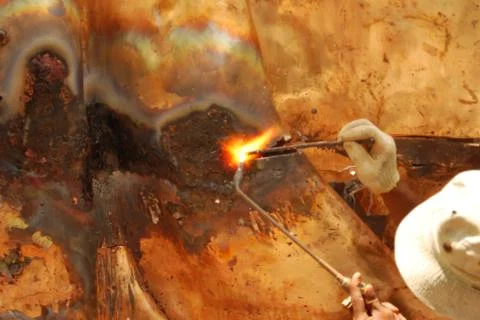 Creative artwork by welding copper and gold metal Stock Photos
