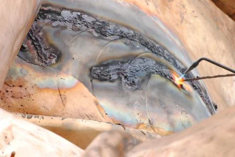 Creative artwork by welding copper and gold metal Stock Photos