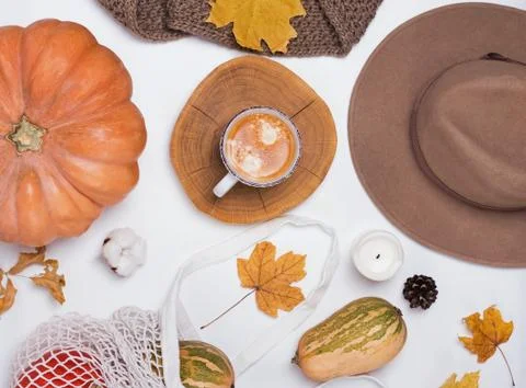 Creative autumn composition with pumpkins yellow leaves Stock Photos