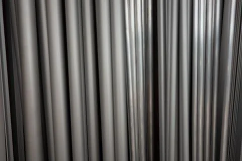 Creative background from aluminum profile of different cross-section. Stock Photos