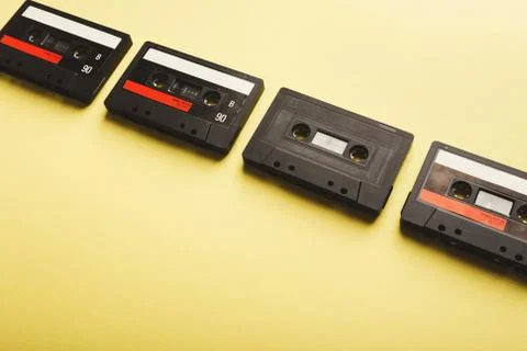Creative background with audio cassettes of different colors Stock Photos