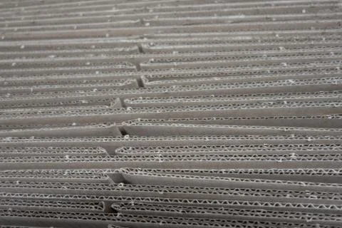Creative background from corrugated packaging cardboard. Stock Photos