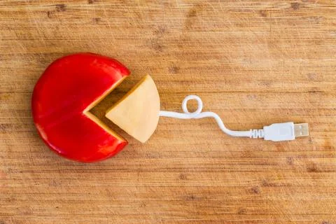 Creative background featuring gouda cheese wheel Stock Photos