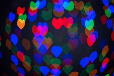 Creative background of glowing blurred hearts in blurred key for nostalgic love Stock Photos