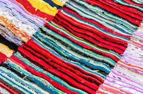 Creative background from handmade doormats Stock Photos