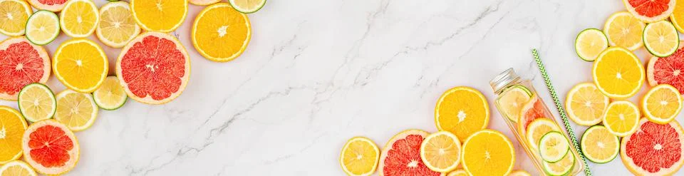 Creative background made of summer tropical fruits with grapefruit, orange, t Foto stock