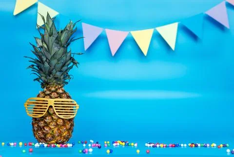 Creative background with pineapple character in sunglasses copy space. Happ.. Stock Photos