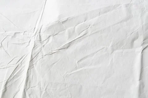 Creative background with scattered overlay of crumpled white paper. Stock Photos