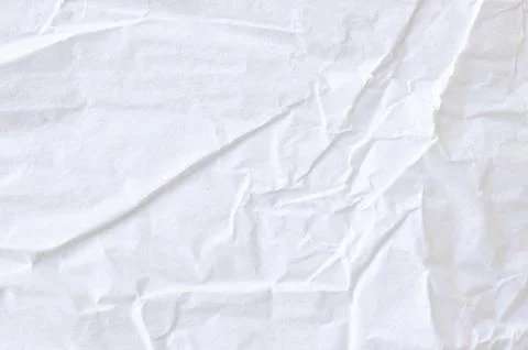 Creative background with scattered overlay of crumpled white paper. Stock Photos