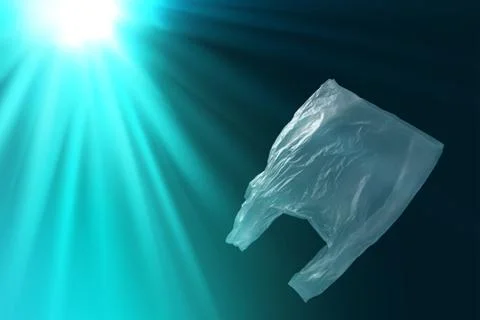 Creative background of single-use plastic bag floating in sea or ocean Stock Photos
