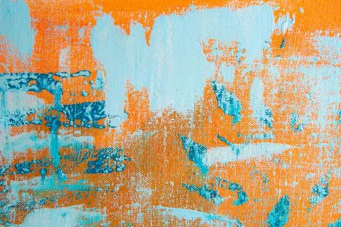 Creative background, a spot of  colored primer rubbed on the surface of a lin Stock Photos