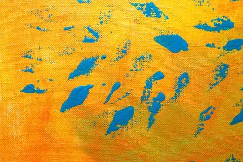 Creative background, a spot of  colored primer rubbed on the surface of a lin Foto stock