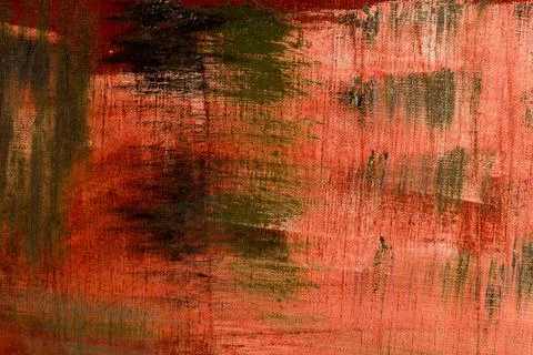 Creative background, a spot of  colored primer rubbed on the surface of a lin Stock Photos