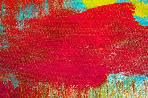 Creative background, a spot of  colored primer rubbed on the surface of a l.. Stock Photos