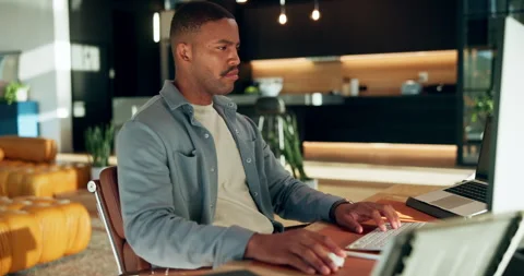 Creative, black man and remote work in home with computer, research and report Stock Footage 337496982