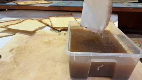 A creative botanical project featuring pressed and dried flowers, handmade paper Stock Footage 314796346