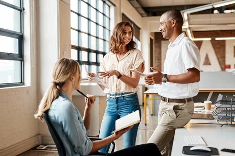 Creative, brainstorming or team in office with notes, ad feedback or review.. Stock Photos