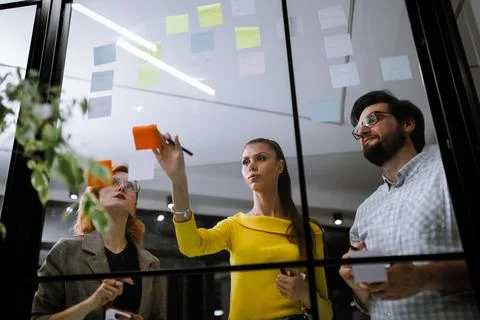 Creative brainstorming session in an office environment with team members Stock Photos