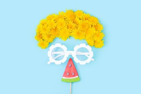 Creative bright summer concept. Abstract face of a tourist made with glasses, Stock Photos