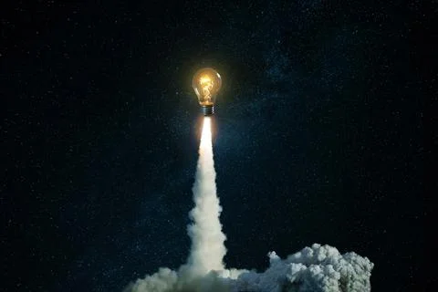 Creative burning light bulb rocket with blast and clouds of smoke successfu.. 库存照片