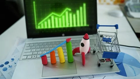 Creative Business Analysis with Clay Graph and Rocket Model, A laptop keybo.. Stock Footage 304882025