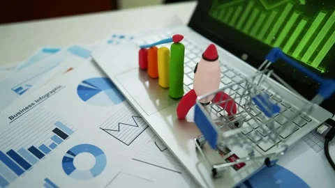 Creative Business Analysis with Clay Graph and Rocket Model, A laptop keybo.. Stock Footage 304882044
