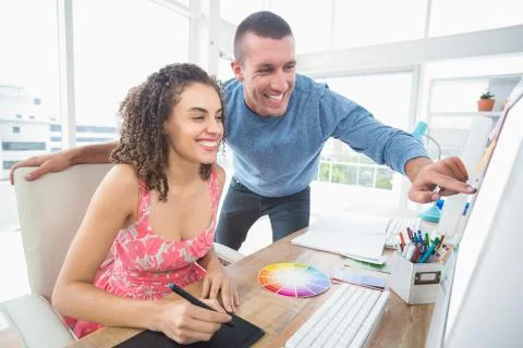Creative business colleagues working on computer Foto stock
