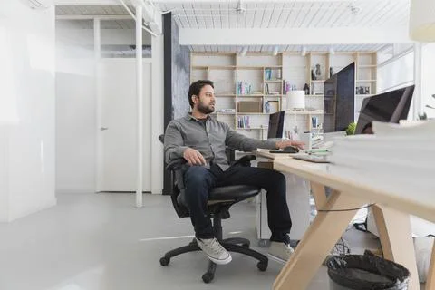 Creative business owner using computer in studio 스톡 사진