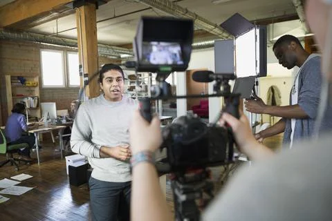 Creative business people filming tutorial Foto stock