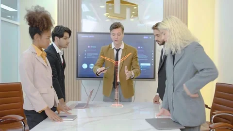 Creative business people Makes a Presentation of 3D wind Turbine Model Stock Footage 244023559