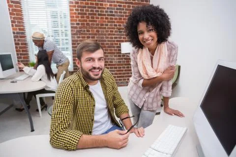 Creative business people using computer Foto stock