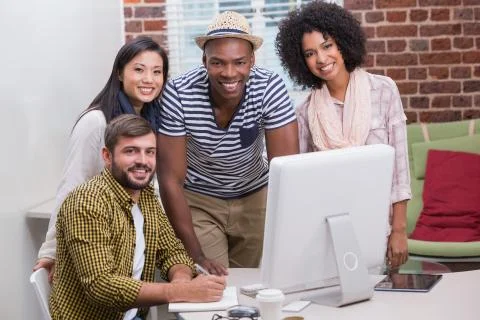 Creative business people using computer Foto stock