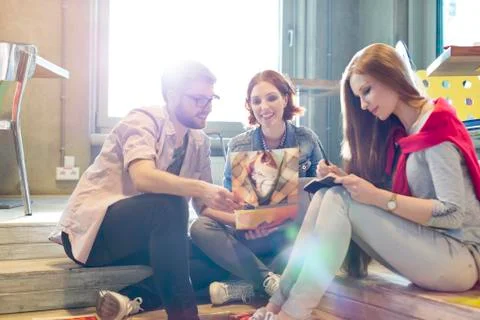 Creative business people working on steps Stock Photos