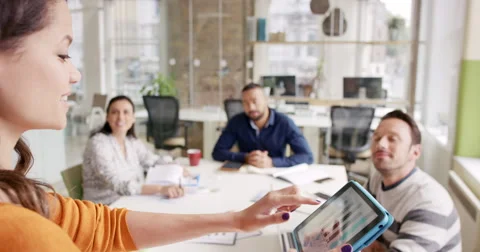 Creative Business team meeting woman manager presenting financial data to Stock Footage 59135368
