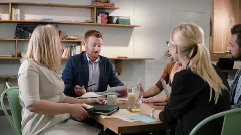 Creative business team at the table in a modern startup office. male leader Stock Footage 68918339