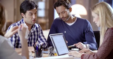 Creative business team work meeting an at agency office. Two young colleagues Stock-Footage 75307553