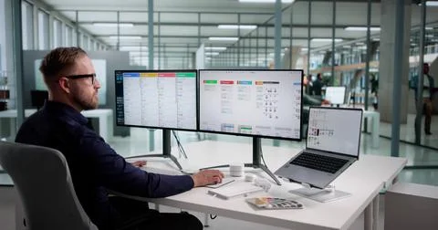 Creative Businessman Developing User-friendly Software On Office Computer Scr Stock Photos