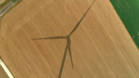 Creative Camera Spinning Along with Wind Turbine Blades - France 4K Drone  Stock Footage 259847993