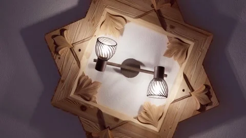 Creative ceiling light made out of wood Stock Footage 283341796