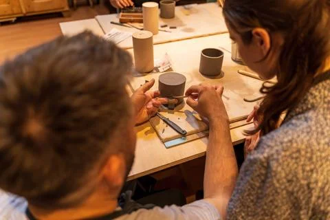 Creative Ceramic Workshop with Hands Crafting Pottery Stock Photos