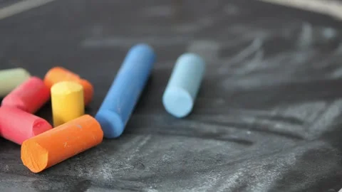 Creative chalk drawing exercise on a chalkboard in a classroom Video stock 303538218