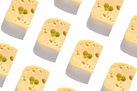 Creative cheese pattern with harsh shadow. Maasdam with holes white backgroun Illustrazione stock