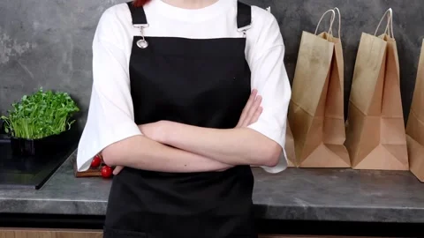 Creative chef prepares fresh ingredients in a stylish kitchen setting 스톡 동영상 296316609